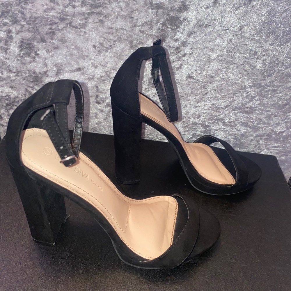 Strappy black heels